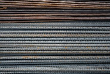 construction-steel-reinforcement-closeup-selective-focus-warehouse-building-materials-repair-construction-buildings-houses_166373-3679