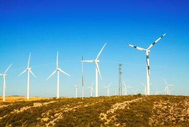 Wind Turbines at farmland in summer. Aragon, Spain